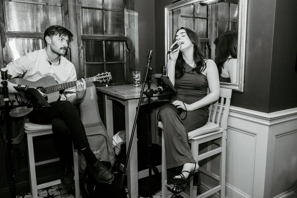 The New Retros acoustic duo performing