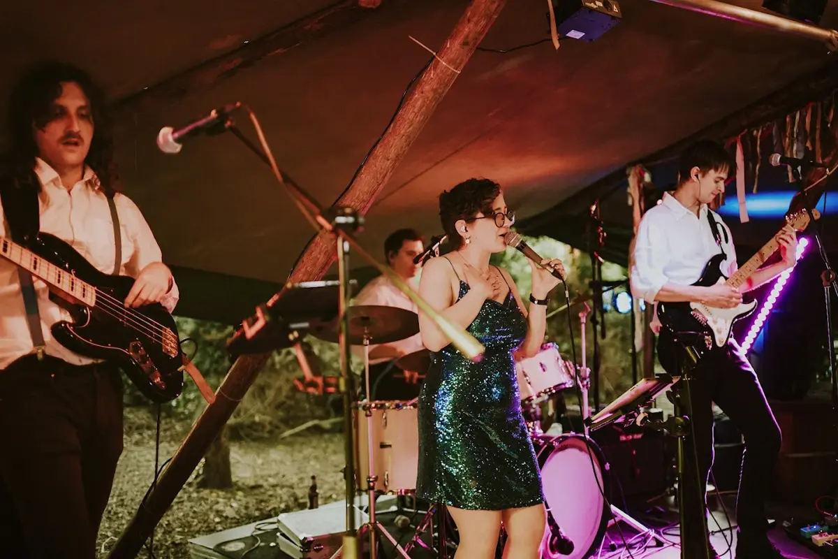 The New Retros performing in a tipi